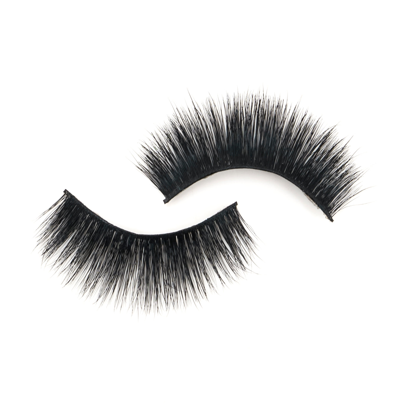 Pair of black 3D mink lashes from NEW BEAUTY DEPOT with dense, fluffy texture on white background