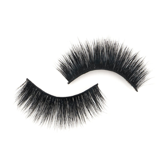 Pair of black 3D mink lashes from NEW BEAUTY DEPOT with dense, fluffy texture on white background