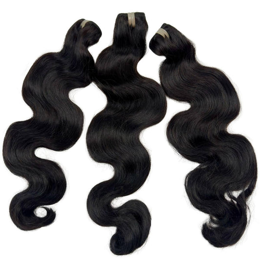 Three bundles of black Vietnamese body wave hair bundles with soft waves and natural shine